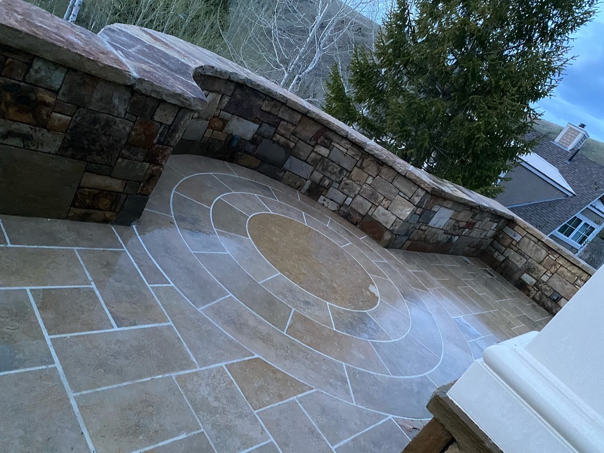 outdoor circular patio masonry installation