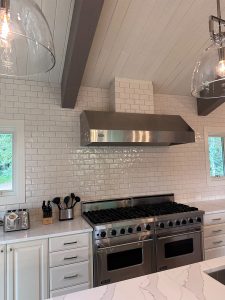 white tile kitchen backsplash