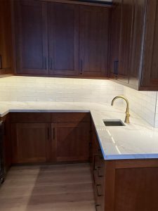 white tile backsplash in kitchen