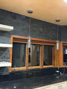 custom dark stone kitchen backsplash installation